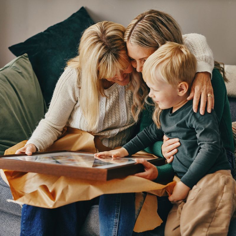 Family looking at photo book