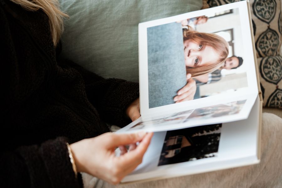 Premium photo book being read on a couch