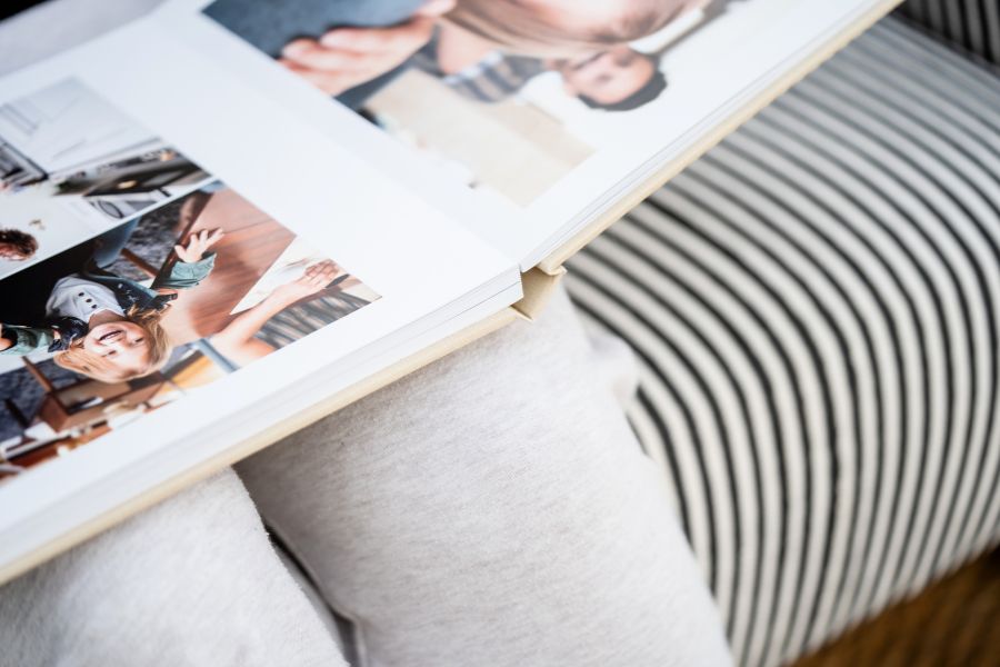 Premium photo book being read on a couch
