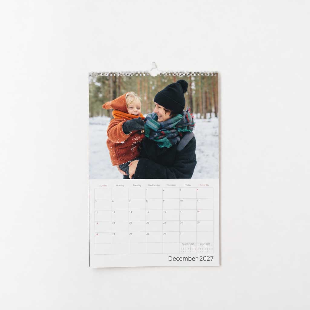 An A3 Personalised Photo Calendar 2027 on a clean wall