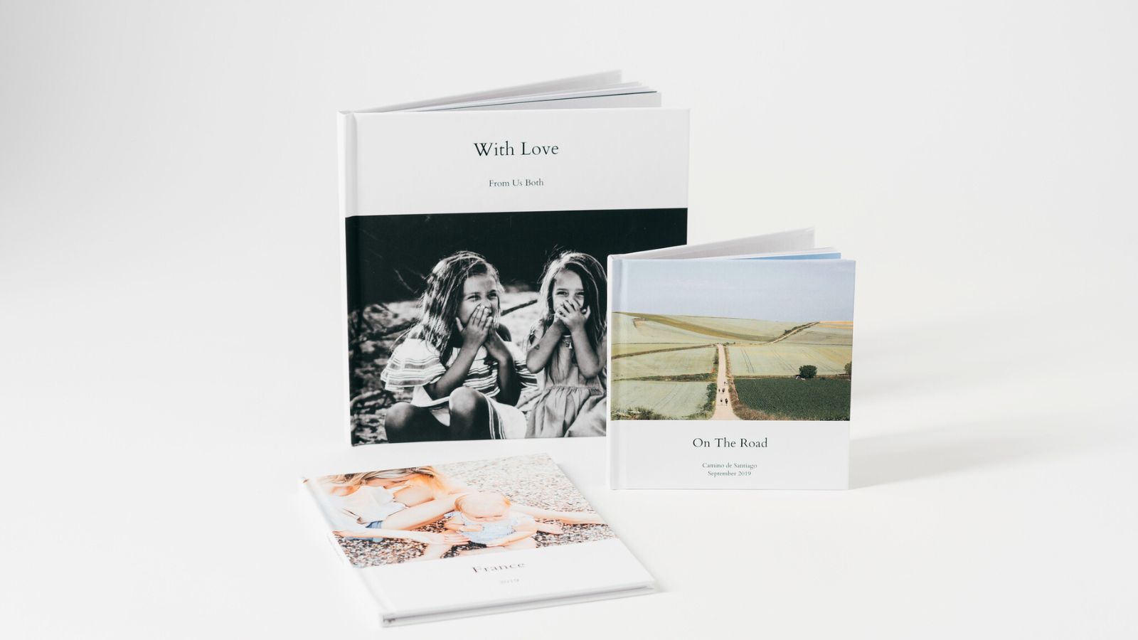 Selection of Inkifi photo books in mini, square, landscape and wedding sizes