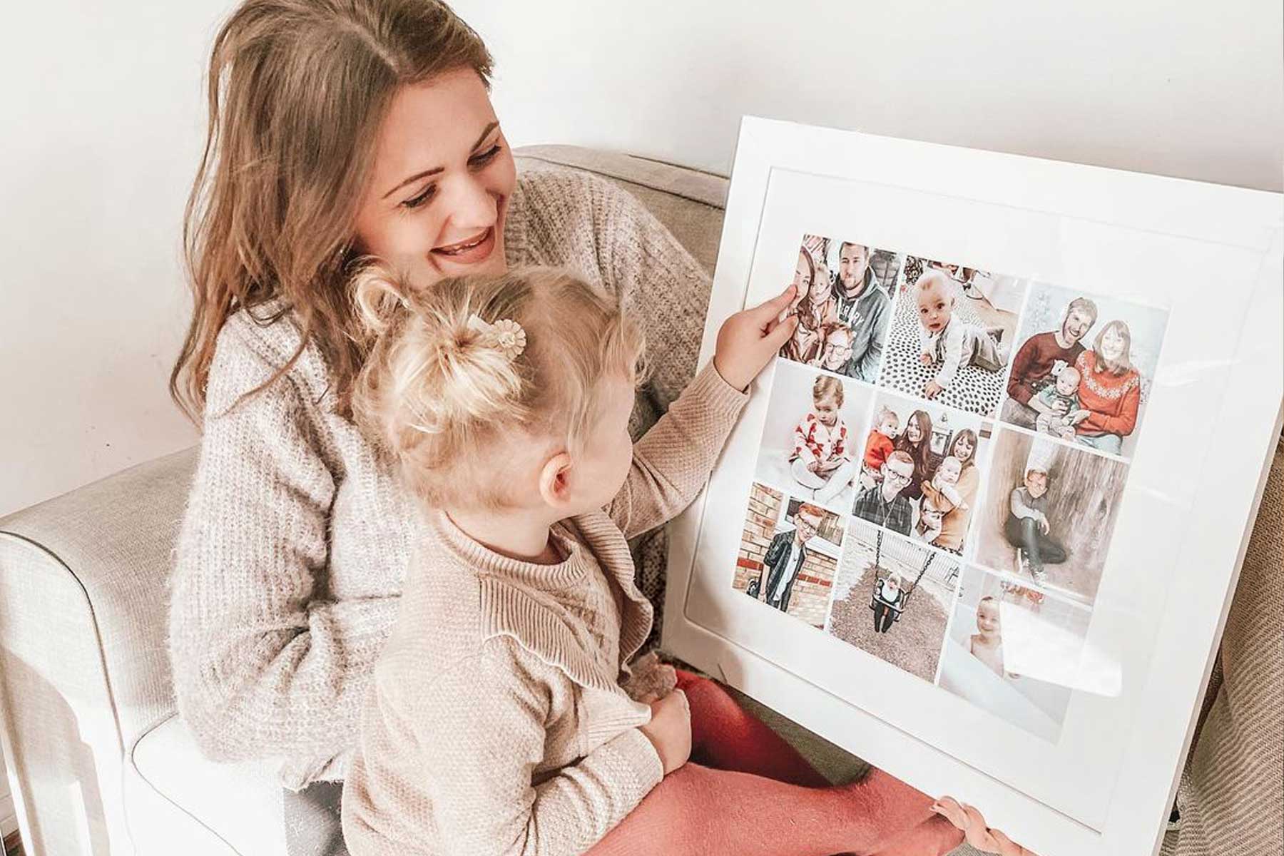 Image showing a mother and young daughter looking at a classic frame