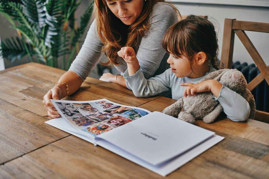 reading a holiday photo book image
